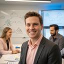 Kledian Trigrillo, cloud database engineer, working with a team on a cloud migration plan